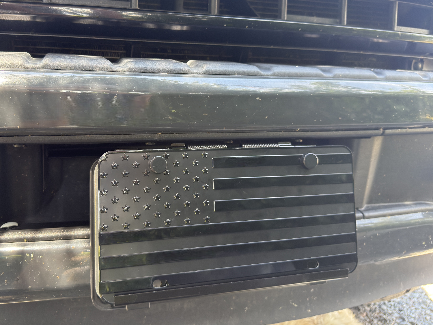 FLIP FLOW, BEHIND THE LICENSE PLATE AIR CHUCK.